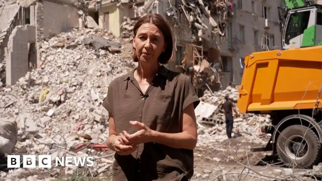 Watch: BBC at site of deadly Russian attack on Kyiv flats